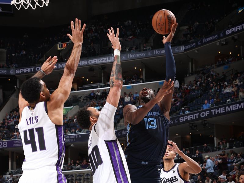 MEMPHIS, TN - JANUARY 29:  Jaren Jackson Jr. #13 of the Memphis Grizzlies drives to the basket during the game against the Sacramento Kings on January 29, 2024 at FedExForum in Memphis, Tennessee. NOTE TO USER: User expressly acknowledges and agrees that, by downloading and or using this photograph, User is consenting to the terms and conditions of the Getty Images License Agreement. Mandatory Copyright Notice: Copyright 2024 NBAE (Photo by Joe Murphy/NBAE via Getty Images)