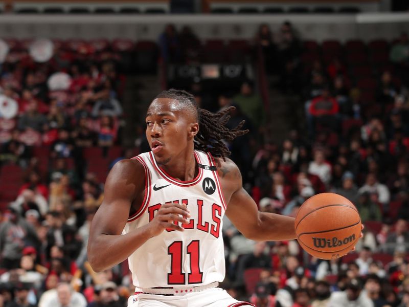 CHICAGO, IL - DECEMBER 8: Ayo Dosunmu #11 of the Chicago Bulls dribbles the ball during the game against the Philadelphia 76ers on December 8, 2024 at United Center in Chicago, Illinois. NOTE TO USER: User expressly acknowledges and agrees that, by downloading and or using this photograph, User is consenting to the terms and conditions of the Getty Images License Agreement. Mandatory Copyright Notice: Copyright 2024 NBAE (Photo by Gary Dineen/NBAE via Getty Images)