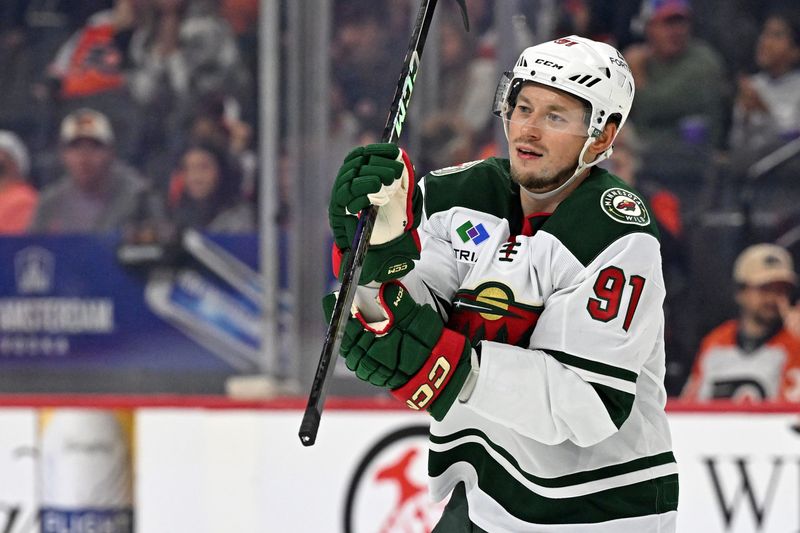 Oct 18, 2025; Philadelphia, Pennsylvania, USA; Minnesota Wild right wing Vladimir Tarasenko (91) skates back to the bench after scoring a goal against the Philadelphia Flyers during the second period at Wells Fargo Center. Mandatory Credit: Eric Hartline-Imagn Images
