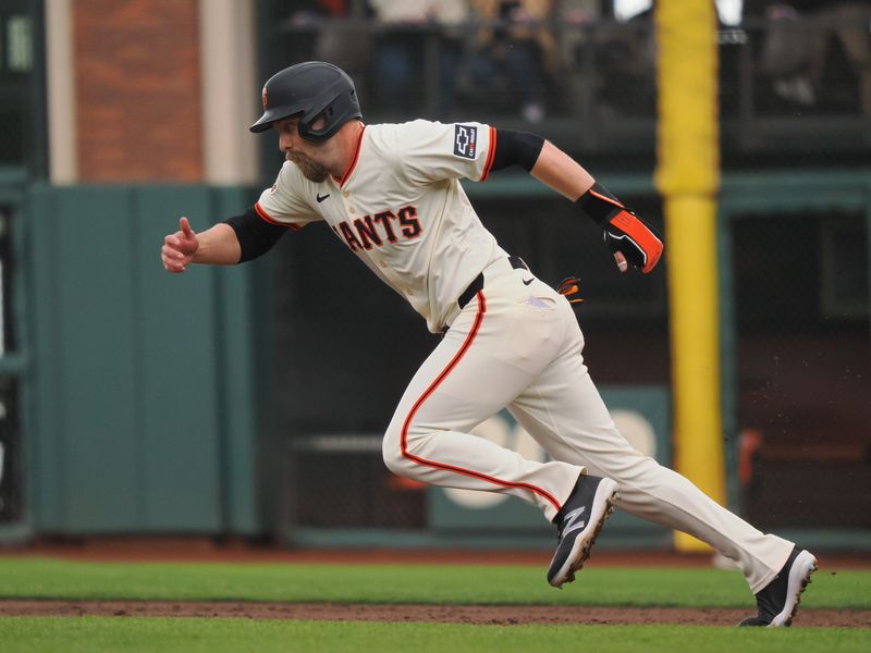 Apr 24, 2024; San Francisco, California, USA; San Francisco Giants right fielder Austin Slater (13) runs to steal second base against the New York Mets during the third inning at Oracle Park. Mandatory Credit: Kelley L Cox-USA TODAY Sports