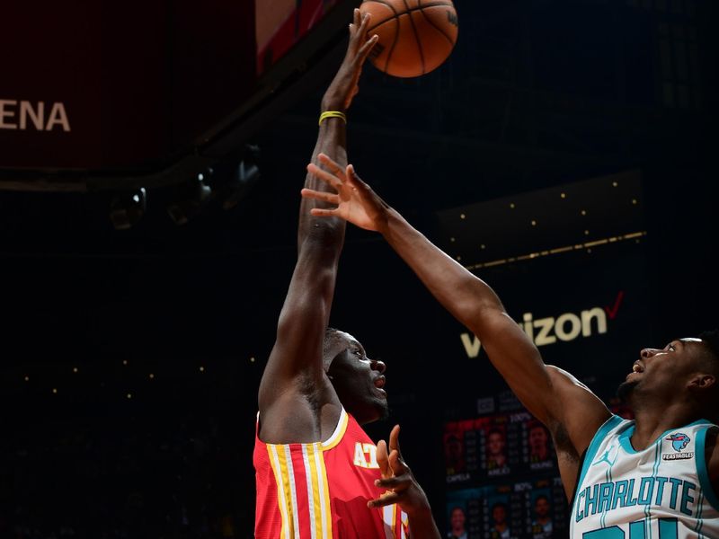 ATLANTA, GA - APRIL 10: Clint Capela #15 of the Atlanta Hawks shoots the ball during the game against the Charlotte Hornets on April 10, 2024 at State Farm Arena in Atlanta, Georgia.  NOTE TO USER: User expressly acknowledges and agrees that, by downloading and/or using this Photograph, user is consenting to the terms and conditions of the Getty Images License Agreement. Mandatory Copyright Notice: Copyright 2024 NBAE (Photo by Scott Cunningham/NBAE via Getty Images)