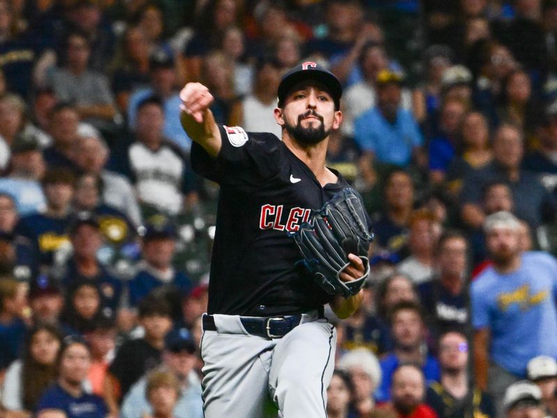 Aug 17, 2024; Milwaukee, Wisconsin, USA;  Cleveland Guardians pitcher Nick Sandlin (52) throws out Milwaukee Brewers left fielder Jackson Chourio (not pictured) in the sixth inning at American Family Field. Mandatory Credit: Benny Sieu-USA TODAY Sports