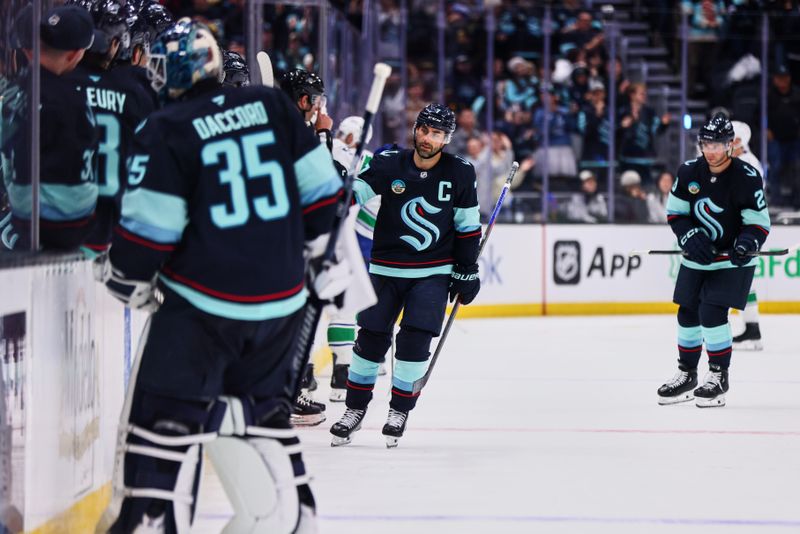Feb 28, 2026; Seattle, Washington, USA; Seattle Kraken right wing Jordan Eberle (7) celebrates after a goal during the third period against the Vancouver Canucks at Climate Pledge Arena. Mandatory Credit: Blake Dahlin-Imagn Images