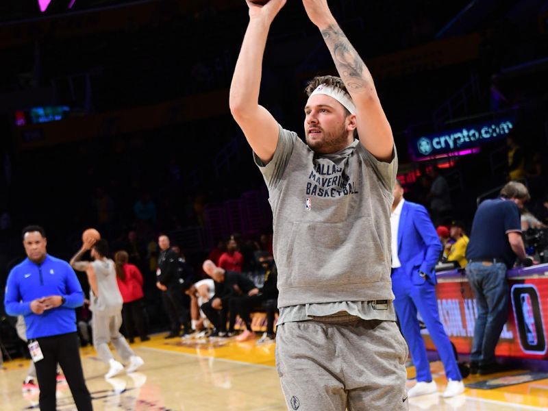 LOS ANGELES, CA - JANUARY 17: Luka Doncic #77 of the Dallas Mavericks warms up before the game against the Los Angeles Lakers on January 17, 2024 at Crypto.Com Arena in Los Angeles, California. NOTE TO USER: User expressly acknowledges and agrees that, by downloading and/or using this Photograph, user is consenting to the terms and conditions of the Getty Images License Agreement. Mandatory Copyright Notice: Copyright 2024 NBAE (Photo by Adam Pantozzi/NBAE via Getty Images)