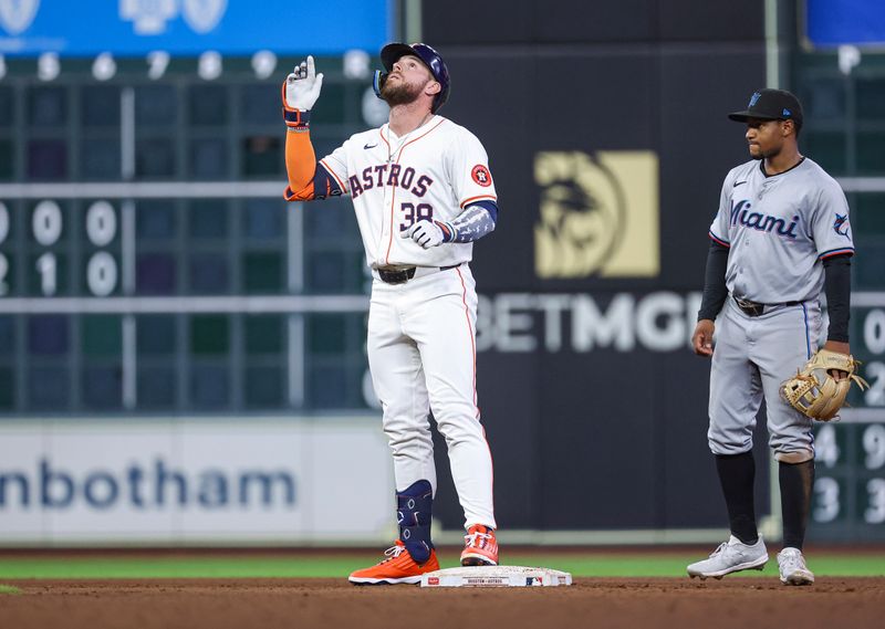 Jul 10, 2024; Houston, Texas, USA; Houston Astros right fielder Trey Cabbage (38) reacts after hitting an RBI double during the sixth inning against the Miami Marlins at Minute Maid Park. Mandatory Credit: Troy Taormina-USA TODAY Sports