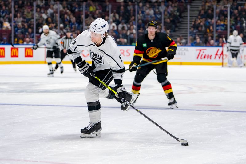 Mar 25, 2024; Vancouver, British Columbia, CAN; Los Angeles Kings forward Adrian Kempe (9) shoots against the Vancouver Canucks in the second period at Rogers Arena. Mandatory Credit: Bob Frid-USA TODAY Sports
