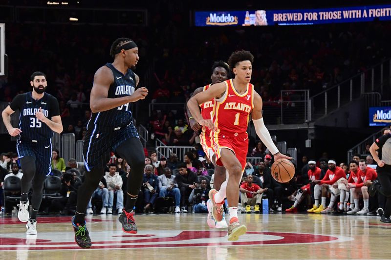 ATLANTA, GA - FEBRUARY 25: Jalen Johnson #1 of the Atlanta Hawks dribbles the ball during the game against the Orlando Magic on February 25, 2024 at State Farm Arena in Atlanta, Georgia.  NOTE TO USER: User expressly acknowledges and agrees that, by downloading and/or using this Photograph, user is consenting to the terms and conditions of the Getty Images License Agreement. Mandatory Copyright Notice: Copyright 2024 NBAE (Photo by Scott Cunningham/NBAE via Getty Images)