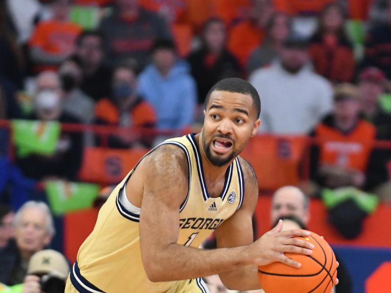 Feb 28, 2023; Syracuse, New York, USA; Georgia Tech Yellow Jackets guard Kyle Sturdivant (1) brings the ball up court against the Syracuse Orange in the first half at the JMA Wireless Dome. Mandatory Credit: Mark Konezny-USA TODAY Sports