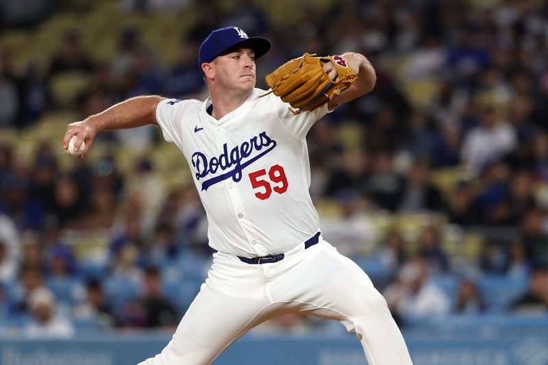 Jun 1, 2024; Los Angeles, California, USA;  Los Angeles Dodgers relief pitcher Evan Phillips (59) pitches during the ninth inning against the Colorado Rockies at Dodger Stadium. Mandatory Credit: Kiyoshi Mio-USA TODAY Sports