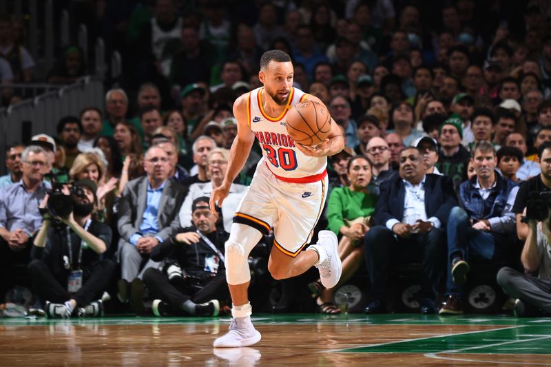 BOSTON, MA - NOVEMBER 6: Stephen Curry #30 of the Golden State Warriors dribbles the ball during the game against the Boston Celtics on November 6, 2024 at TD Garden in Boston, Massachusetts. NOTE TO USER: User expressly acknowledges and agrees that, by downloading and/or using this Photograph, user is consenting to the terms and conditions of the Getty Images License Agreement. Mandatory Copyright Notice: Copyright 2024 NBAE (Photo by Brian Babineau/NBAE via Getty Images)