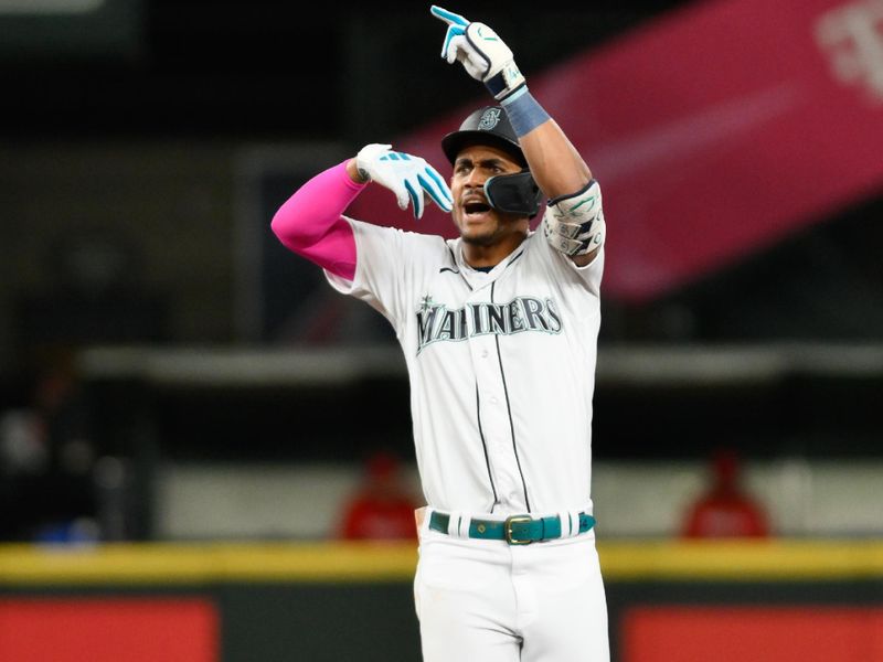 Sep 11, 2023; Seattle, Washington, USA; Seattle Mariners center fielder Julio Rodriguez (44) celebrates hitting a double against the Los Angeles Angels during the sixth inning at T-Mobile Park. Mandatory Credit: Steven Bisig-USA TODAY Sports