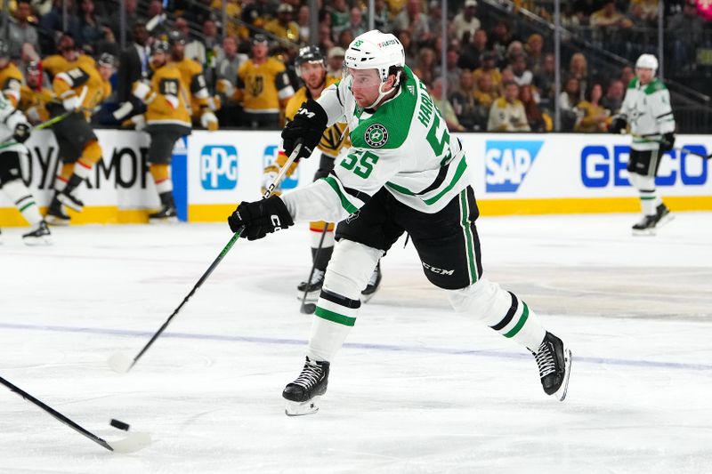 May 3, 2024; Las Vegas, Nevada, USA; Dallas Stars defenseman Thomas Harley (55) shoots against the Vegas Golden Knights during the second period of game six of the first round of the 2024 Stanley Cup Playoffs at T-Mobile Arena. Mandatory Credit: Stephen R. Sylvanie-USA TODAY Sports