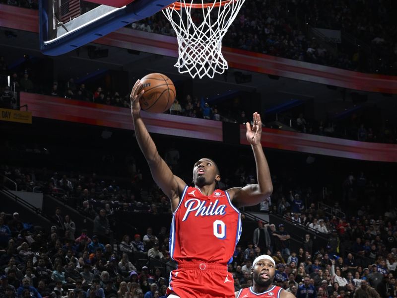 PHILADELPHIA, PA - NOVEMBER 22: Tyrese Maxey #0 of the Philadelphia 76ers drives to the basket during the game against the Brooklyn Nets during the Emirates NBA Cup game on November 22, 2024 at the Wells Fargo Center in Philadelphia, Pennsylvania NOTE TO USER: User expressly acknowledges and agrees that, by downloading and/or using this Photograph, user is consenting to the terms and conditions of the Getty Images License Agreement. Mandatory Copyright Notice: Copyright 2024 NBAE (Photo by David Dow/NBAE via Getty Images)