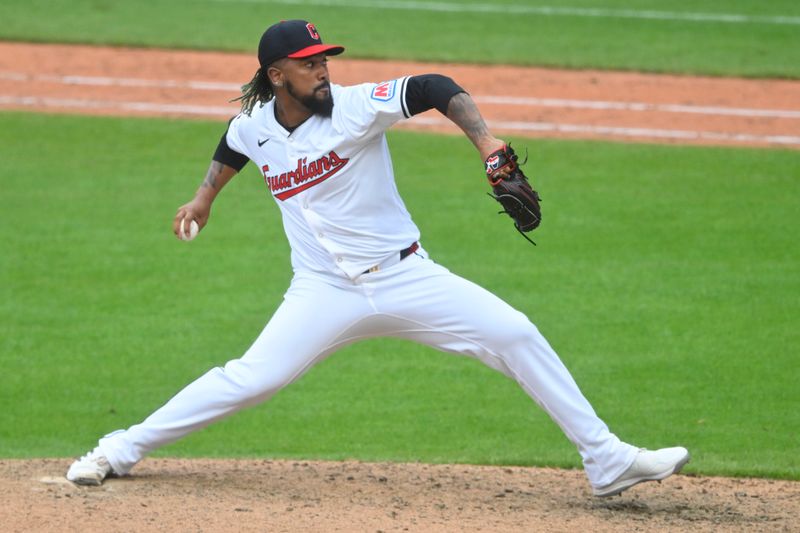 Jun 22, 2024; Cleveland, Ohio, USA; Cleveland Guardians relief pitcher Emmanuel Clase (48) delivers against the Toronto Blue Jays in the ninth inning at Progressive Field. Mandatory Credit: David Richard-USA TODAY Sports