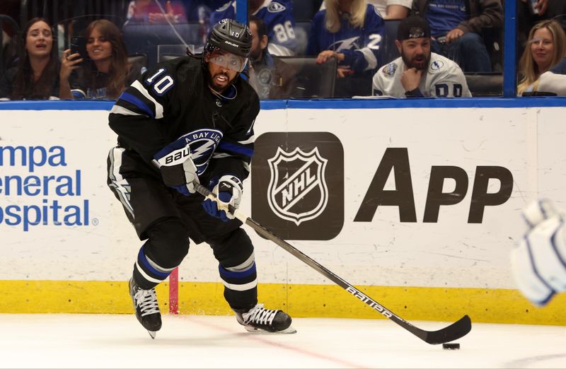 Apr 17, 2024; Tampa, Florida, USA; Tampa Bay Lightning left wing Anthony Duclair (10) skates with the puck against the Toronto Maple Leafs during the third period at Amalie Arena. Mandatory Credit: Kim Klement Neitzel-USA TODAY Sports