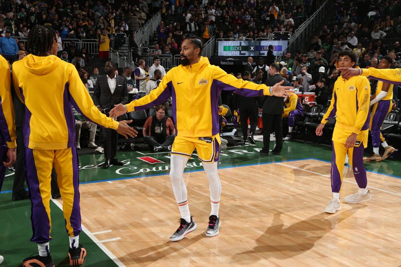 MILWAUKEE, WI - MARCH 26: Spencer Dinwiddie #26 of the Los Angeles Lakers is introduced before the game against the Milwaukee Bucks on March 26, 2024 at the Fiserv Forum Center in Milwaukee, Wisconsin. NOTE TO USER: User expressly acknowledges and agrees that, by downloading and or using this Photograph, user is consenting to the terms and conditions of the Getty Images License Agreement. Mandatory Copyright Notice: Copyright 2024 NBAE (Photo by Gary Dineen/NBAE via Getty Images).