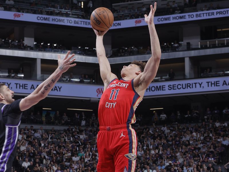 SACRAMENTO, CA - APRIL 11: Dyson Daniels #11 of the New Orleans Pelicans rebounds the ball during the game against the Sacramento Kings on April 11, 2024 at Golden 1 Center in Sacramento, California. NOTE TO USER: User expressly acknowledges and agrees that, by downloading and or using this Photograph, user is consenting to the terms and conditions of the Getty Images License Agreement. Mandatory Copyright Notice: Copyright 2024 NBAE (Photo by Rocky Widner/NBAE via Getty Images)