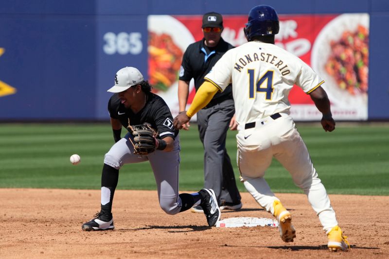 Mar 13, 2024; Phoenix, Arizona, USA; Chicago White Sox second baseman Nicky Lopez (8) gets the force play on Milwaukee Brewers second baseman Andruw Monasterio (14) in the third inning at American Family Fields of Phoenix. Mandatory Credit: Rick Scuteri-USA TODAY Sports