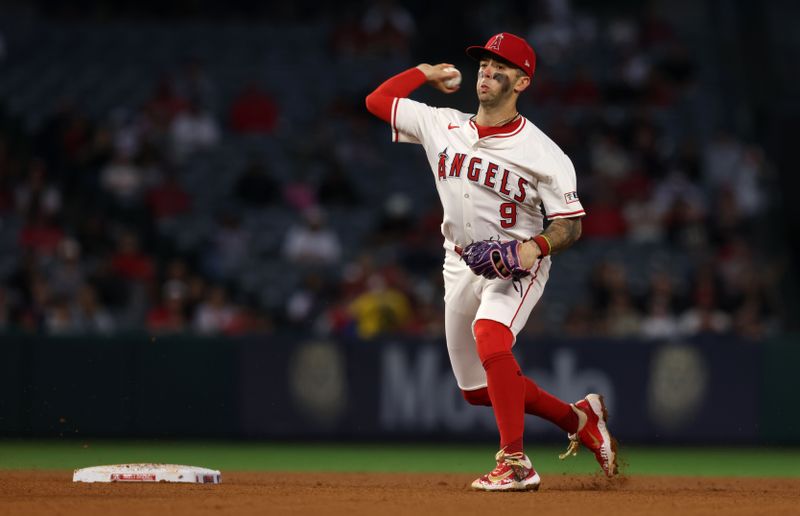 May 2, 2025; Anaheim, California, USA; Los Angeles Angels shortstop Zach Neto (9) throws to first for an out during the fourth inning against the Detroit Tigers at Angel Stadium. Mandatory Credit: Jason Parkhurst-Imagn Images