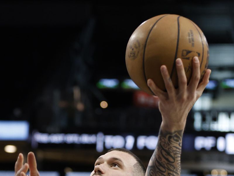 SAN ANTONIO, TX - APRIL 7:  Sandro Mamukelashvili #54 of the San Antonio Spurs takes warm up shots before their game against the Philadelphia 76ers at Frost Bank Center on April 7, 2024 in San Antonio, Texas. NOTE TO USER: User expressly acknowledges and agrees that, by downloading and or using this photograph, User is consenting to terms and conditions of the Getty Images License Agreement. (Photo by Ronald Cortes/Getty Images)