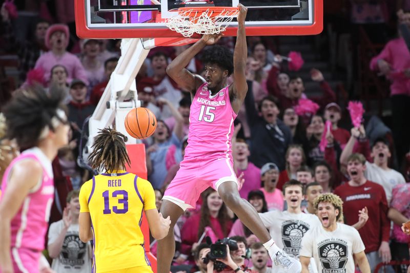 Jan 24, 2023; Fayetteville, Arkansas, USA; Arkansas Razorbacks forward Makhi Mitchell (15) dunks the ball in the second half against the LSU Tigers at Bud Walton Arena. Arkansas won 60-40. Mandatory Credit: Nelson Chenault-USA TODAY Sports