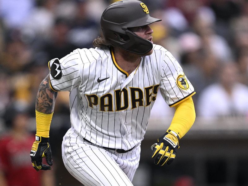 Aug 19, 2023; San Diego, California, USA; San Diego Padres left fielder Ben Gamel (16) hits a single against the Arizona Diamondbacks during the third inning at Petco Park. Mandatory Credit: Orlando Ramirez-USA TODAY Sports