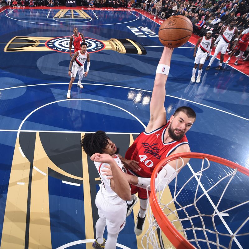 INGLEWOOD, CA - DECEMBER 3: Ivica Zubac #40 of the LA Clippers dunks the ball during the game against the Portland Trail Blazers on December 3, 2024 at Intuit Dome in Los Angeles, California. NOTE TO USER: User expressly acknowledges and agrees that, by downloading and/or using this Photograph, user is consenting to the terms and conditions of the Getty Images License Agreement. Mandatory Copyright Notice: Copyright 2024 NBAE (Photo by Juan Ocampo/NBAE via Getty Images)