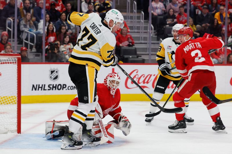 Oct 18, 2023; Detroit, Michigan, USA; Pittsburgh Penguins center Jeff Carter (77) tries to screen Detroit Red Wings goaltender Ville Husso (35) in the third period at Little Caesars Arena. Mandatory Credit: Rick Osentoski-USA TODAY Sports