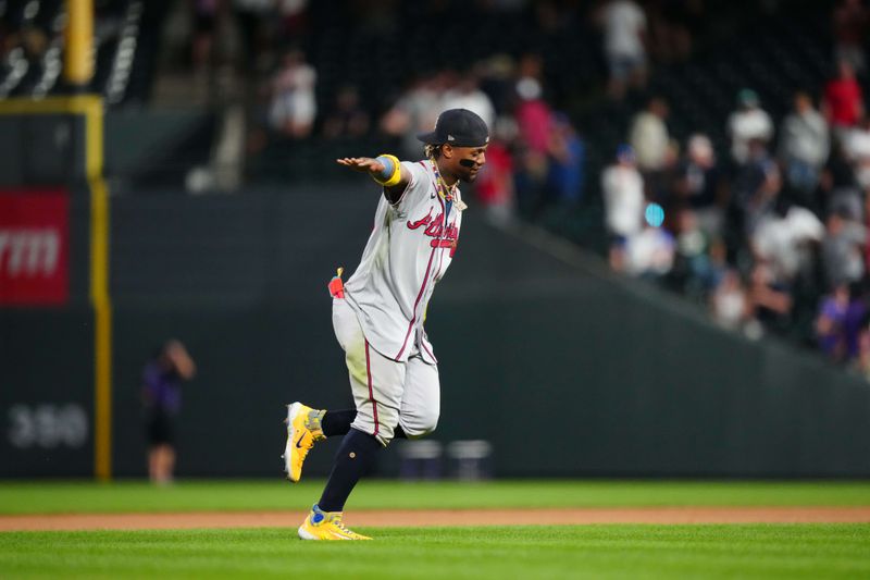 Aug 30, 2023; Denver, Colorado, USA; Atlanta Braves right fielder Ronald Acuna Jr. (13) celebrates defeating the Colorado Rockies at Coors Field. Mandatory Credit: Ron Chenoy-USA TODAY Sports