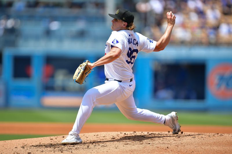 May 19, 2024; Los Angeles, California, USA; Los Angeles Dodgers pitcher Landon Knack (96) throws against the Cincinnati Reds during the third inning at Dodger Stadium. Mandatory Credit: Gary A. Vasquez-USA TODAY Sports