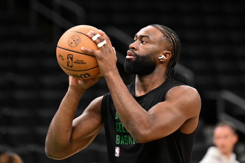 BOSTON, MASSACHUSETTS - APRIL 07: Jaylen Brown #7 of the Boston Celtics takes a shot during warmups before a game against the Portland Trail Blazers at the TD Garden on April 07, 2024 in Boston, Massachusetts. NOTE TO USER: User expressly acknowledges and agrees that, by downloading and or using this photograph, User is consenting to the terms and conditions of the Getty Images License Agreement. (Photo by Brian Fluharty/Getty Images)