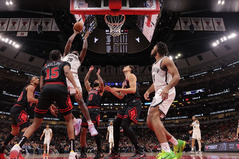 CHICAGO, IL - MARCH 13: Day'Ron Sharpe #20 of the Brooklyn Nets drives to the basket during the game against the Chicago Bulls on March 13, 2025 at United Center in Chicago, Illinois. NOTE TO USER: User expressly acknowledges and agrees that, by downloading and or using this photograph, User is consenting to the terms and conditions of the Getty Images License Agreement. Mandatory Copyright Notice: Copyright 2025 NBAE  (Photo by Melissa Tamez/NBAE via Getty Images)