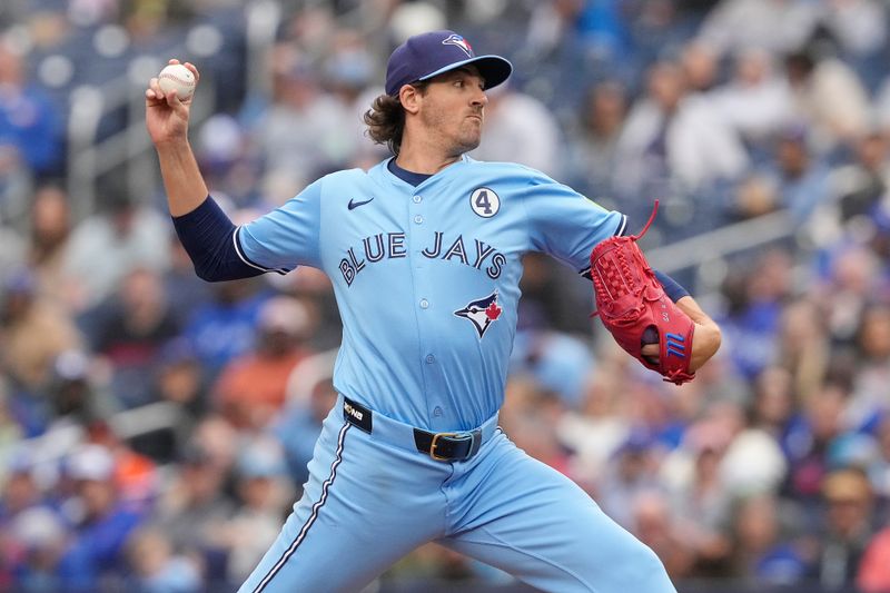 Jun 1, 2025; Toronto, Ontario, CAN; Toronto Blue Jays starting pitcher Kevin Gausman (34) pitches to the Oakland Athletics during the fifth inning at Rogers Centre. Mandatory Credit: John E. Sokolowski-Imagn Images