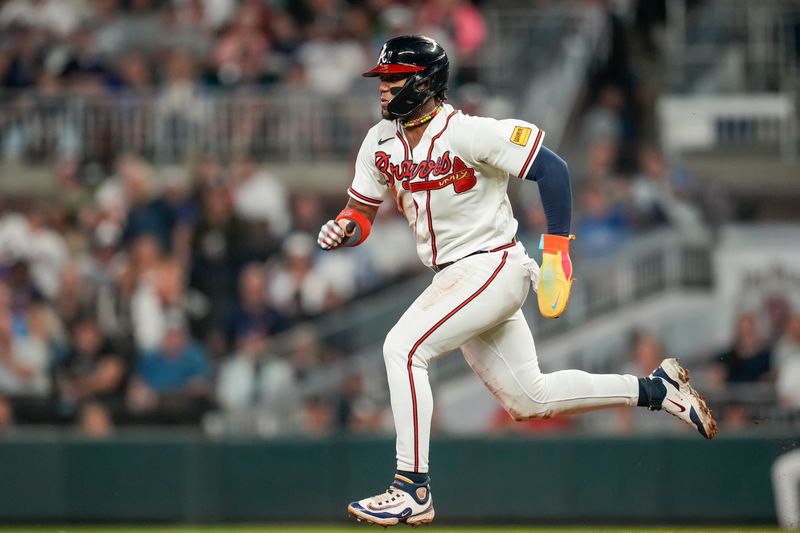 Sep 27, 2023; Cumberland, Georgia, USA; Atlanta Braves right fielder Ronald Acuna Jr. (13) steals a base against the Chicago Cubs during the eighth inning at Truist Park. Mandatory Credit: Dale Zanine-USA TODAY Sports