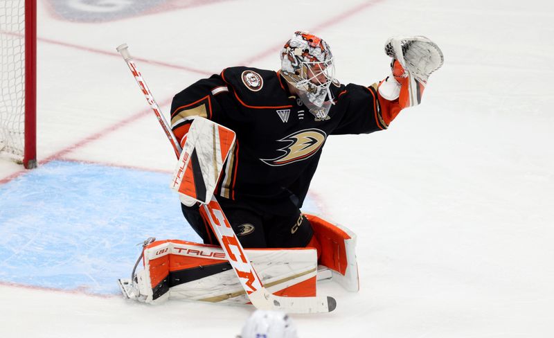 Mar 24, 2024; Anaheim, California, USA; Anaheim Ducks goaltender Lukas Dostal (1) makes a save during the third period against the Tampa Bay Lightning at Honda Center. Mandatory Credit: Jason Parkhurst-USA TODAY Sports