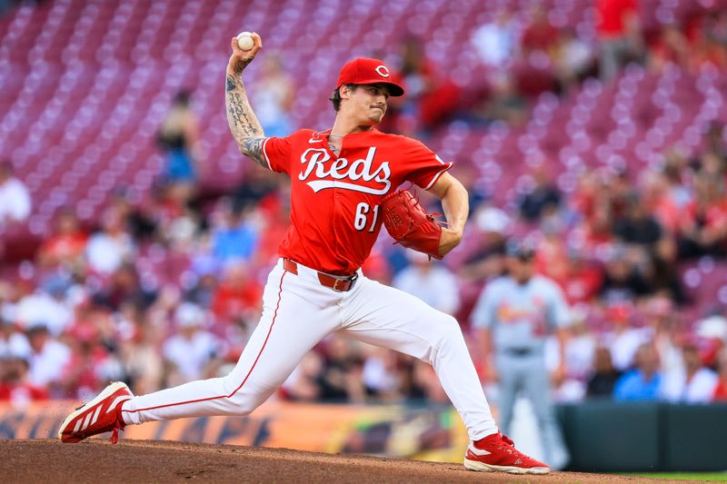 Apr 30, 2025; Cincinnati, Ohio, USA; Cincinnati Reds starting pitcher Chase Petty (61) pitches against the St. Louis Cardinals in the first inning at Great American Ball Park. Mandatory Credit: Katie Stratman-Imagn Images