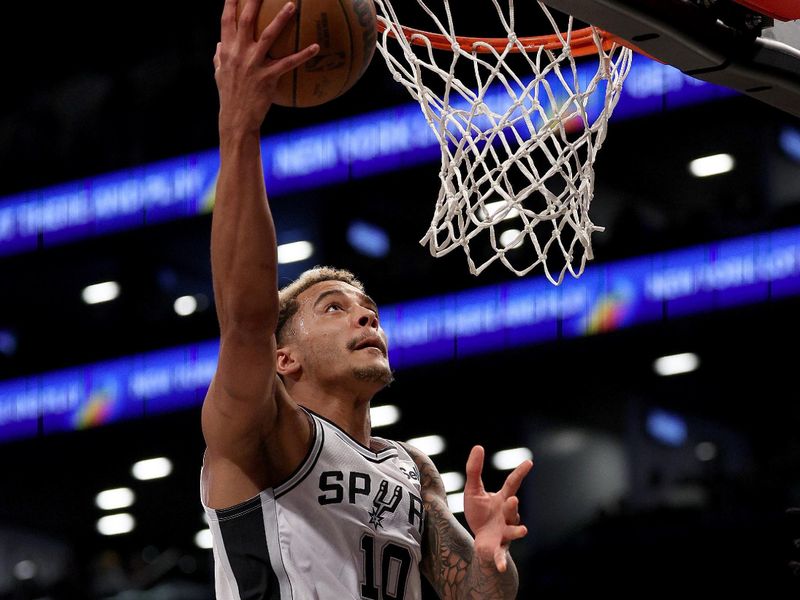 NEW YORK, NEW YORK - FEBRUARY 10: Jeremy Sochan #10 of the San Antonio Spurs heads for the net in the first half against the Brooklyn Nets at Barclays Center on February 10, 2024 in the Brooklyn borough of New York City. NOTE TO USER: User expressly acknowledges and agrees that, by downloading and or using this photograph, User is consenting to the terms and conditions of the Getty Images License Agreement. (Photo by Elsa/Getty Images)