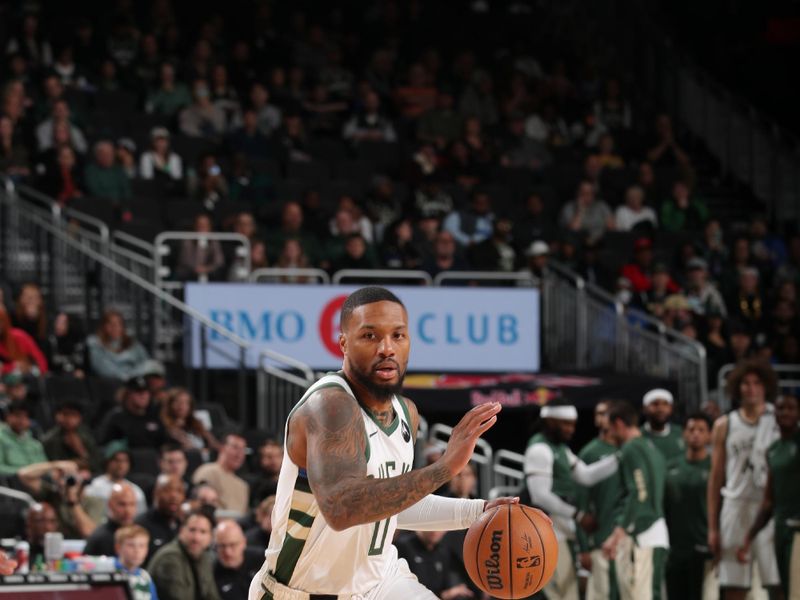 MILWAUKEE, WI - OCTOBER 20: Damian Lillard #0 of the Milwaukee Bucks drives to the basket during the preseason game on October 20, 2023 at the Fiserv Forum Center in Milwaukee, Wisconsin. NOTE TO USER: User expressly acknowledges and agrees that, by downloading and or using this Photograph, user is consenting to the terms and conditions of the Getty Images License Agreement. Mandatory Copyright Notice: Copyright 2023 NBAE (Photo by Gary Dineen/NBAE via Getty Images).