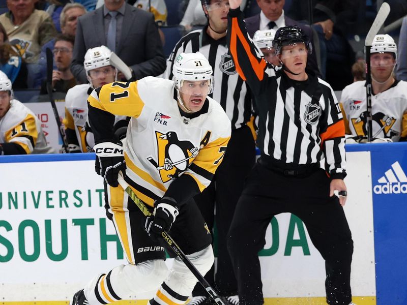Dec 6, 2023; Tampa, Florida, USA; Pittsburgh Penguins center Evgeni Malkin (71) skates with the puck against the Tampa Bay Lightning during the second period at Amalie Arena. Mandatory Credit: Kim Klement Neitzel-USA TODAY Sports