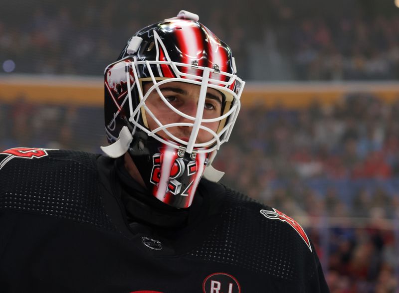 Dec 9, 2023; Buffalo, New York, USA;  Buffalo Sabres goaltender Devon Levi (27) during a stoppage in play against the Montreal Canadiens during the second period at KeyBank Center. Mandatory Credit: Timothy T. Ludwig-USA TODAY Sports