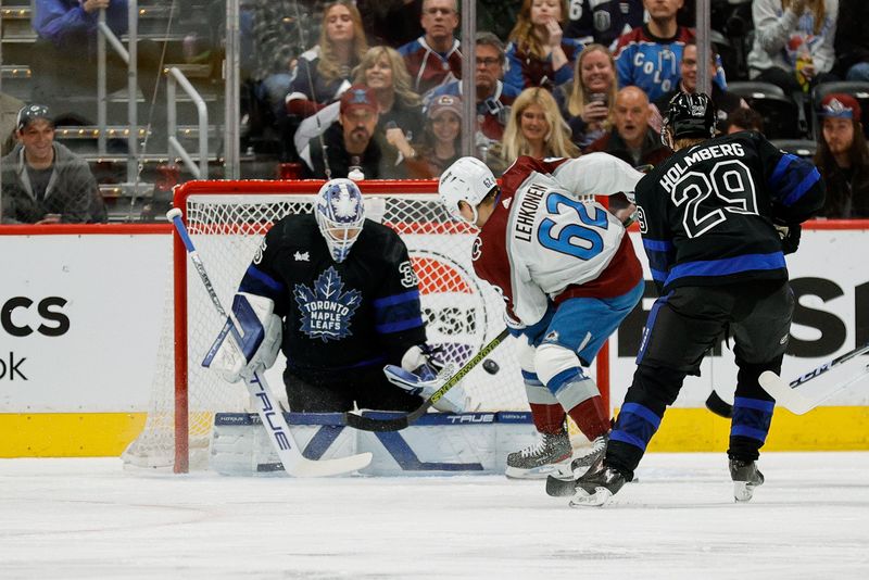 Feb 24, 2024; Denver, Colorado, USA; Colorado Avalanche left wing Artturi Lehkonen (62) scores a goal against Toronto Maple Leafs goaltender Ilya Samsonov (35) as right wing Pontus Holmberg (29) defends in the first period at Ball Arena. Mandatory Credit: Isaiah J. Downing-USA TODAY Sports