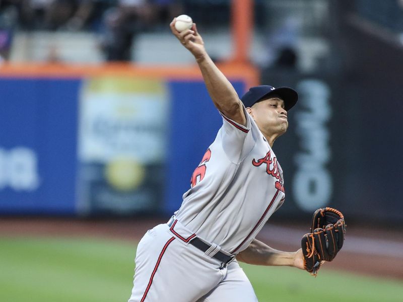 Aug 13, 2023; New York City, New York, USA; Atlanta Braves relief pitcher Yonny Chirinos (56) pitches in the first inning against the New York Mets at Citi Field. Mandatory Credit: Wendell Cruz-USA TODAY Sports