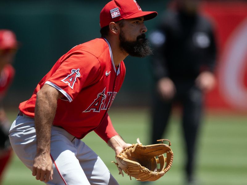 Jul 20, 2024; Oakland, California, USA; Los Angeles Angels third baseman Anthony Rendon (6) readies himself for the next pitch against the Oakland Athletics during the second inning at Oakland-Alameda County Coliseum. Mandatory Credit: D. Ross Cameron-USA TODAY Sports