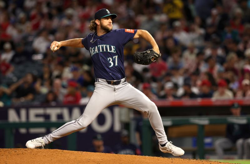 Jun 6, 2025; Anaheim, California, USA; Seattle Mariners pitcher Jackson Kowar (37) throws during the sixth inning against the Los Angeles Angels at Angel Stadium. Mandatory Credit: Jason Parkhurst-Imagn Images