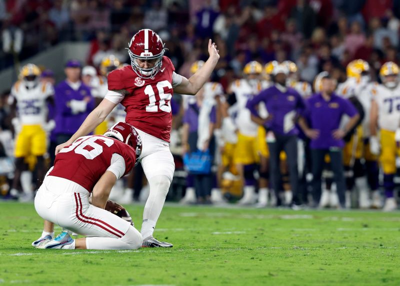 Nov 4, 2023; Tuscaloosa, Alabama, USA; Alabama Crimson Tide place kicker Will Reichard (16) kicks an extra point during the first half at Bryant-Denny Stadium. Mandatory Credit: Butch Dill-USA TODAY Sports