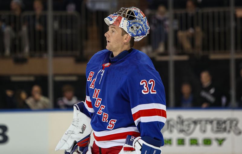 Sep 24, 2024; New York, New York, USA; New York Rangers goalie Jonathan Quick (32) skates to the bench during the second period against the New York Islanders at Madison Square Garden. Mandatory Credit: Danny Wild-Imagn Images