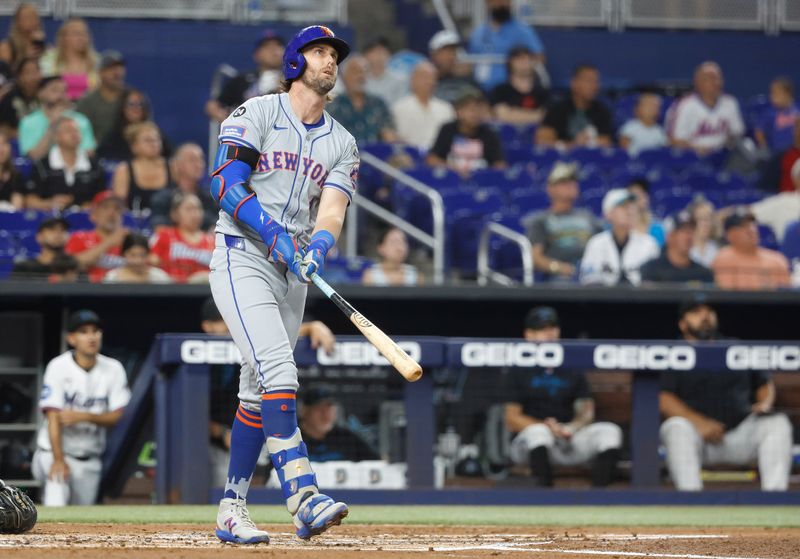 Jul 22, 2024; Miami, Florida, USA;  New York Mets second baseman Jeff McNeil (1) watches his home run against  the Miami Marlins in the second inning at loanDepot Park. Mandatory Credit: Rhona Wise-USA TODAY Sports