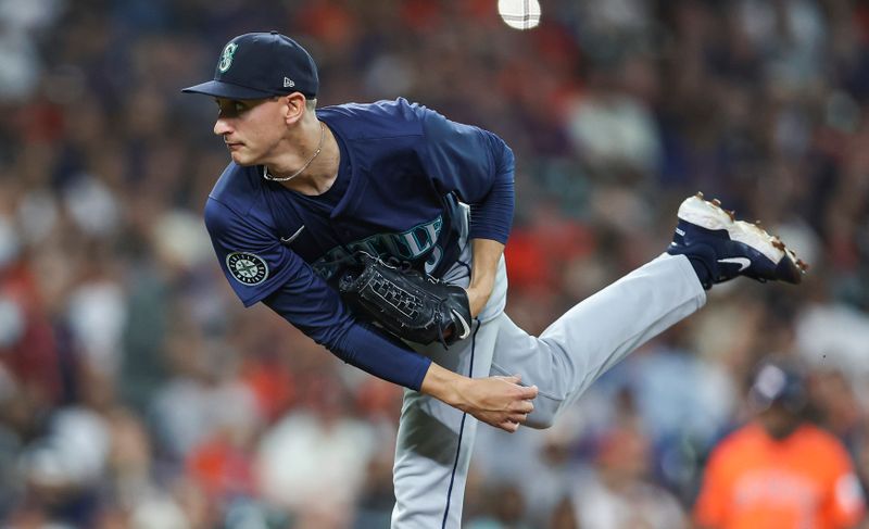 May 3, 2024; Houston, Texas, USA; Seattle Mariners starting pitcher George Kirby (68) delivers a pitch during the first inning against the Houston Astros at Minute Maid Park. Mandatory Credit: Troy Taormina-USA TODAY Sports