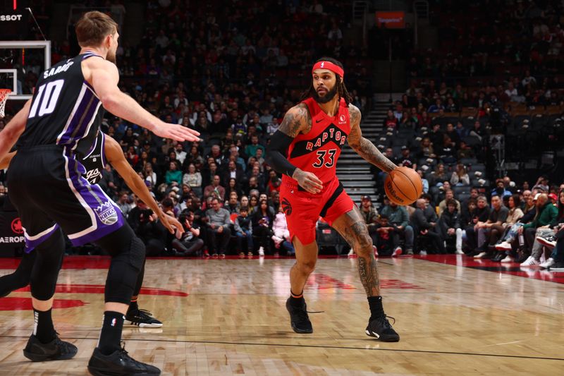 TORONTO, CANADA - MARCH 20: Gary Trent Jr. #33 of the Toronto Raptors dribbles the ball during the game against the Sacramento Kings on March 20, 2024 at the Scotiabank Arena in Toronto, Ontario, Canada.  NOTE TO USER: User expressly acknowledges and agrees that, by downloading and or using this Photograph, user is consenting to the terms and conditions of the Getty Images License Agreement.  Mandatory Copyright Notice: Copyright 2024 NBAE (Photo by Vaughn Ridley/NBAE via Getty Images)