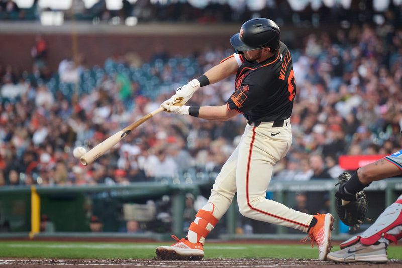 Aug 31, 2024; San Francisco, California, USA; San Francisco Giants infielder Brett Wisely (0) hits a double against the Miami Marlins during the fifth inning at Oracle Park. Mandatory Credit: Robert Edwards-USA TODAY Sports